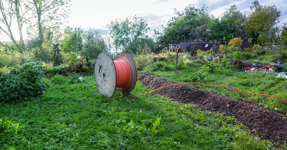 Metronet blog construction fiber reel grass